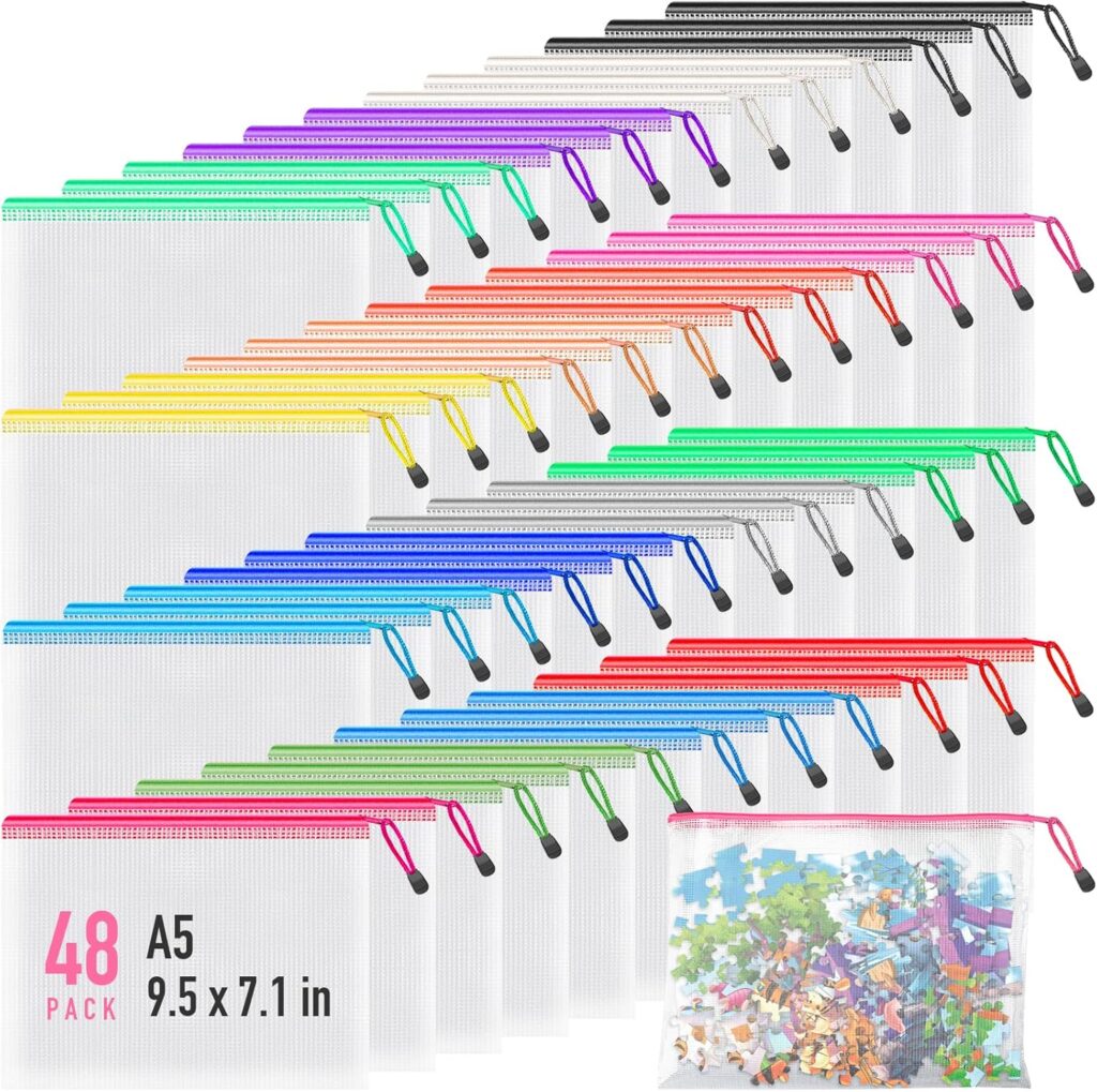 A set of 48 clear mesh zipper pouches with colored zippers (black, orange, yellow, green, blue, purple, red). One pouch is filled with puzzle pieces. Text reads: 48 PACK A5 9.5 x 7.1 in.